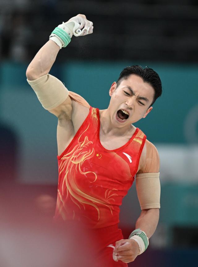 买马挣钱网站app-“双杠奇才”断崖式领先，邹敬园巴黎成功卫冕
